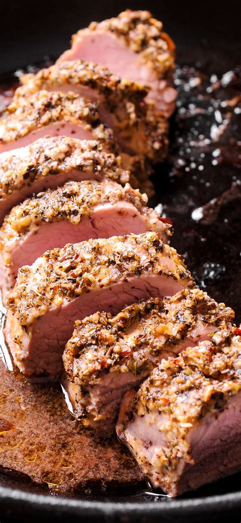 Mustard, Garlic and Herb Crusted Pork Tenderloin is roasted to