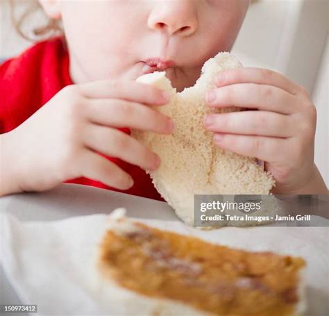 112 Kid Eating Peanut Butter Sandwich Stock Photos, High-Res Pictures ...