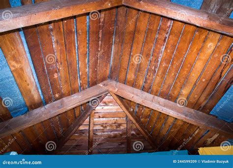 roof view   insidewooden roof rafters  metal roofing