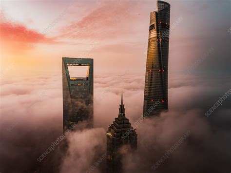 Aerial view of towers in the clouds, Shanghai, China - Stock Image ...