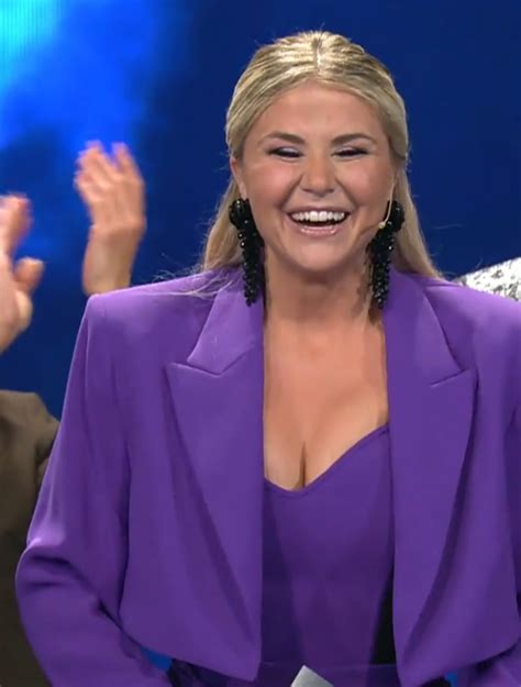 Busty Swiss Singer Beatrice Egli has squeezed her Big DD Tits in a