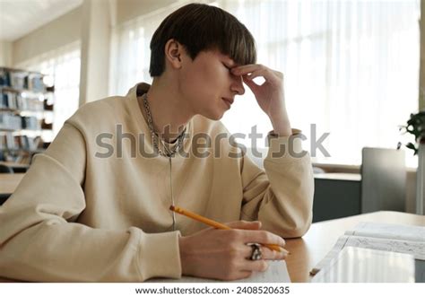 Tired Student Rubbing Eyes Library Stock Photo 2408520635 | Shutterstock