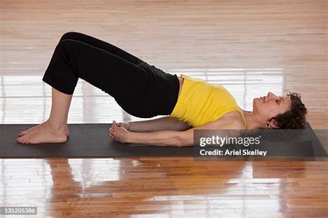 Supine Yoga Poses Photos and Premium High Res Pictures - Getty Images