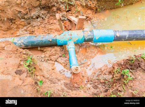repair plumbing pvc broken pipe  hole   water  copy space