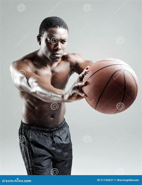 Intense basketball player stock image. Image of focus - 21134637