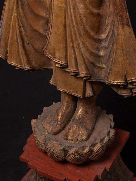 Antique standing Mandalay Buddha statue from Burma