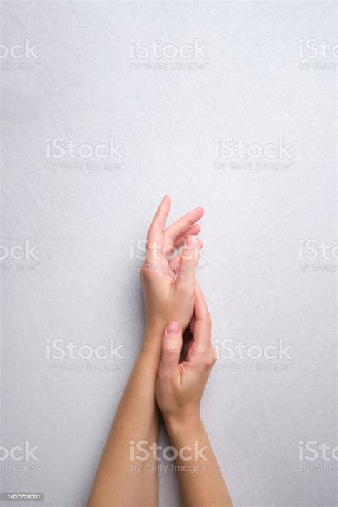beautiful female hands   light background aesthetics  minimalism