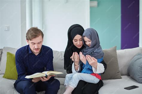 premium photo young muslim family reading quran  ramadan