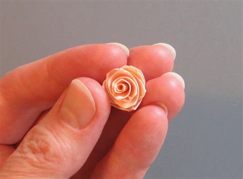Folded Paper Rose | FaveCrafts.com