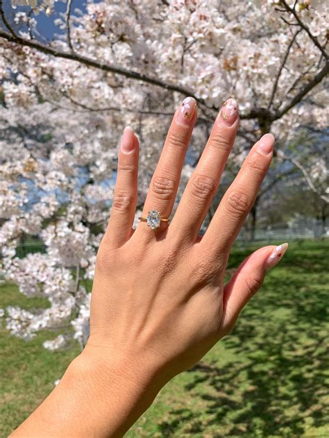 Cherry Blossom Wedding Rings Hailey Bieber's New Stunning Oval Diamond