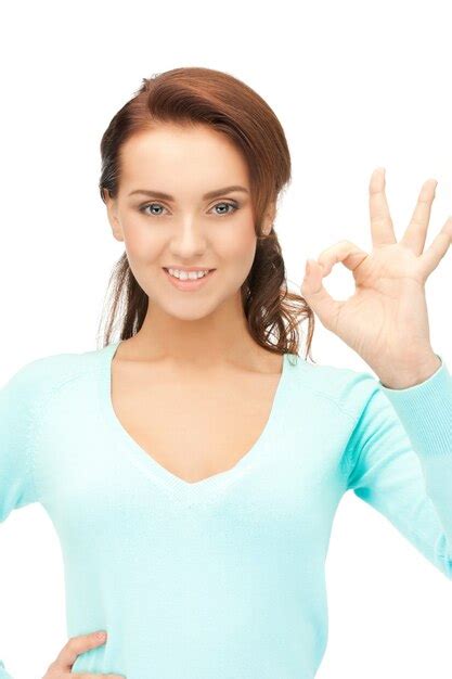 Premium Photo | Bright picture of lovely teenage girl showing ok sign