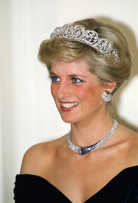Diana, Princess of Wales wears a sapphire and diamond necklace, which