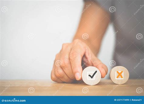 Hand Choose Correct Sign on Circle Wood on Desk for Changing Mindset ...