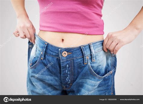 Slim Fit Woman in Jeans — Stock Photo © MitaStockImages #188260006