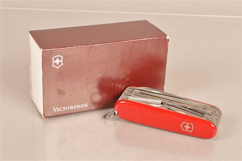 Victorinox - SwissChamp, in red, complete with retailers box Foreword ...
