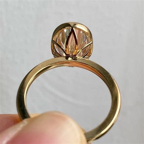 oval cut moissanite bezel tulip basket set solitaire engagement ring