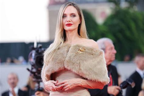 Angelina Jolie Goes Full Glam in Draped Gown for “Maria” Red Carpet ...
