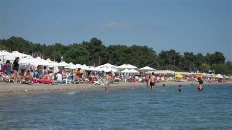 ALEXANDROUPOLIS, GREECE - SEP 1, 2014: Crowded Summer Beach At A ...