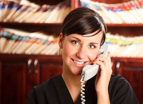 60+ Doctors Office Receptionist On Phone Stock Photos, Pictures ...