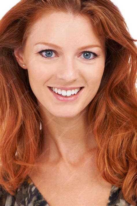 Premium Photo | Flaming beauty Closeup of a gorgeous smiling redhead