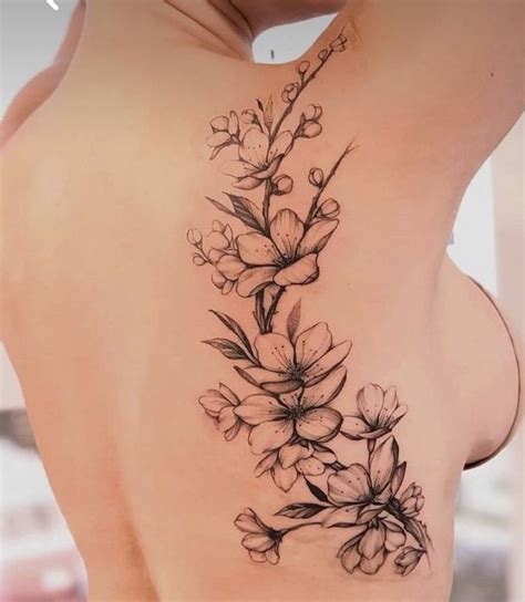 Pin by Melissa Wilson on Tattoos | Tattoos to cover scars, Floral back ...