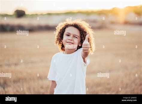 boy, wink, thumbs up, ok, boys, winks, thumb ups Stock Photo - Alamy