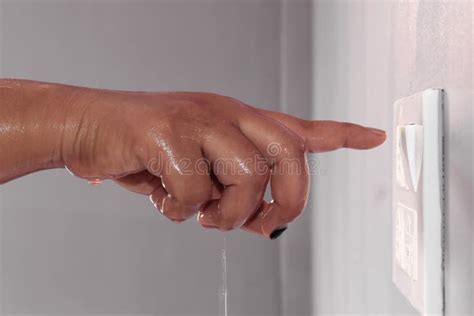 electrical socket wet hands stock   royalty  stock