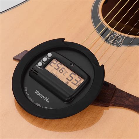 Digital humidifier for acoustic guitar