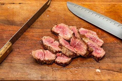 Rare Grade Tri-tip Steak Sliced on Cutting Board Stock Image - Image of ...