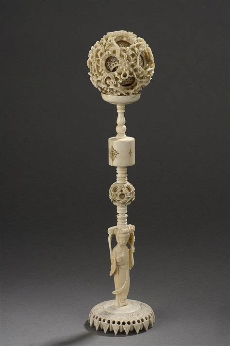 Sold at Auction: Boule de canton sur piètement anthropomorphe ...