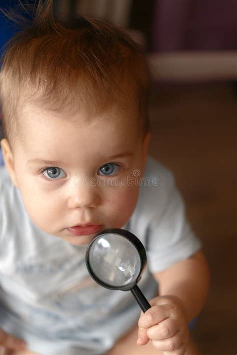 A Child with a Magnifying Glass. Stock Image - Image of research, potty ...