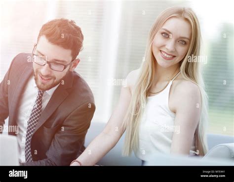 manager  client browsing information   laptop stock photo alamy