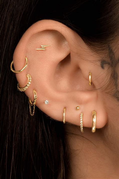 Ear Styling Service | Cool ear piercings, Gold cartilage earrings, Ear ...