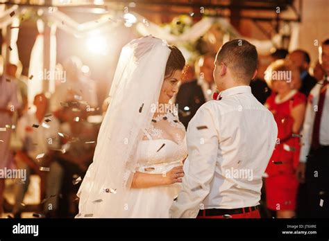 Fantastic wedding couple dancing their first dance in the restaurant ...