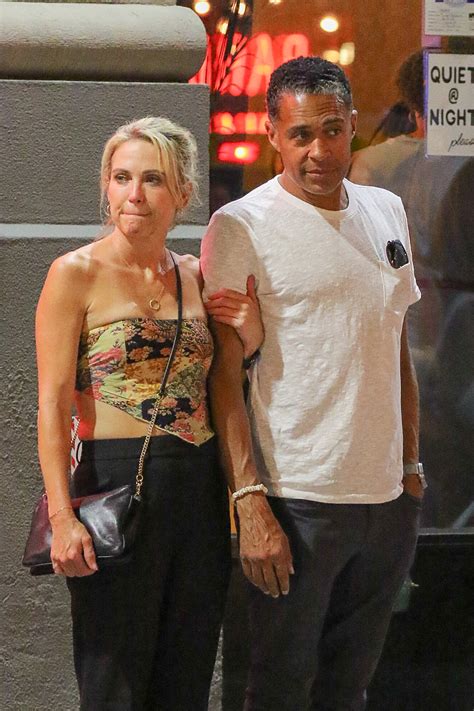 GMA3’s ousted Amy Robach clings on to boyfriend TJ Holmes as she looks