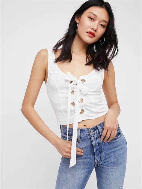 Good Vibes Corset Cami | Cute cropped cami featuring a stylish lace-up