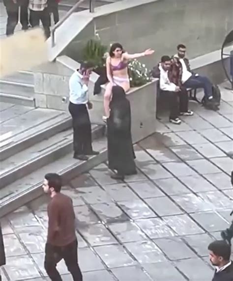 Iranian woman detained after taking clothes off at university in Tehran