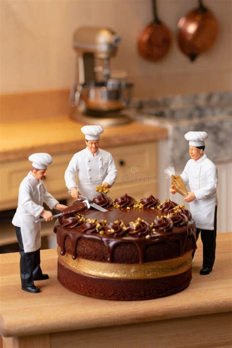 miniature chefs create  stunning chocolate cake masterpiece   cozy