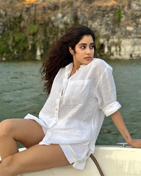 Janhvi Kapoor flaunts her sexy legs in a white shirt with tiny shorts