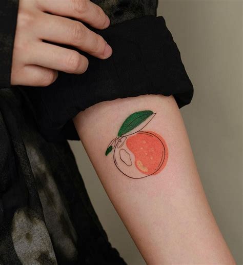 Share 66+ orange fruit tattoo - in.cdgdbentre