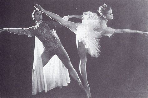 two ballerinas are performing in an old black and white photo