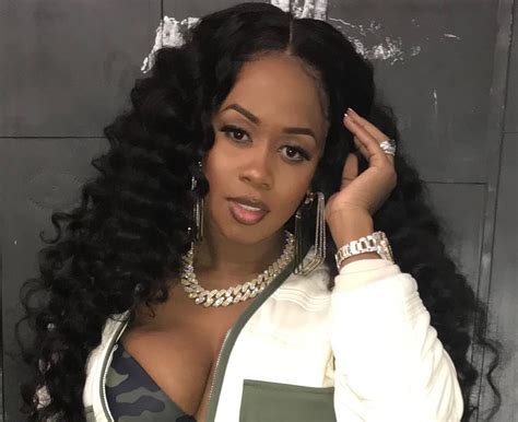 Remy Ma Sets The Runway On Fire In Stunning Red Gown At Fashion Show