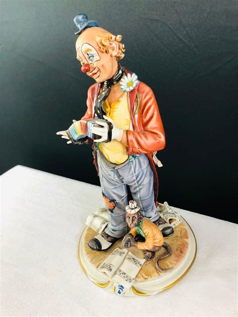 Capodimonte Medea by Rori Porcelain Clown and Monkey statuette or