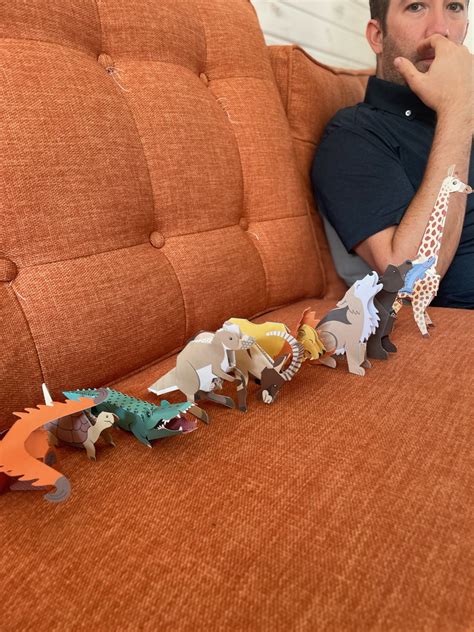 Paperfold Wild Animals: 10 Amazing Punch-Out-and-Fold Paper Creatures