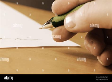 signing  document stock photo alamy