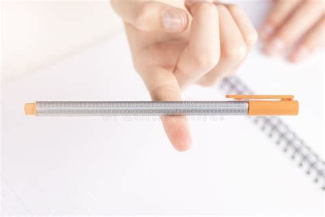 Orange Felt-tip Pen in Balance on a Child`s Finger Stock Image - Image ...