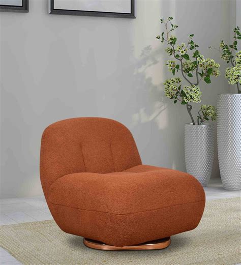 Buy Epephanio Fabric Full BackSwivel Lounge Chair In Rust Colour at 9% ...