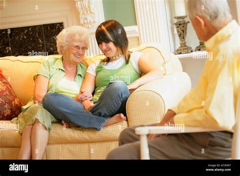 Grandchild with grandparents Stock Photo - Alamy