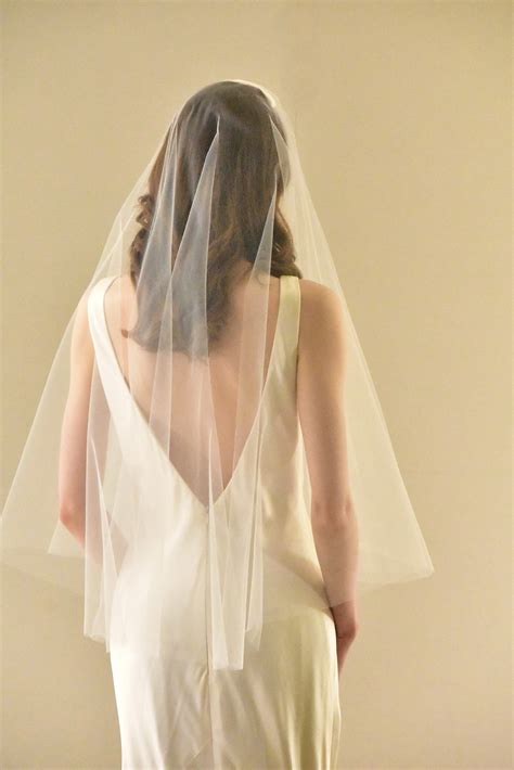 Simple Two Tier Hip Length Veil with Raw Cut Edge | WeddingVeil.com