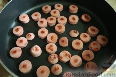 Рецепт: Тушеная капуста с сосисками на RussianFood.com